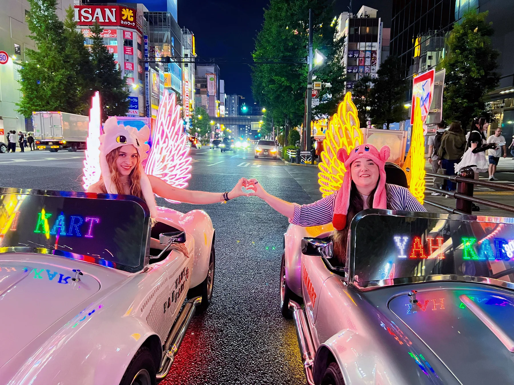 A group of YAH KART guests driving through Tokyo