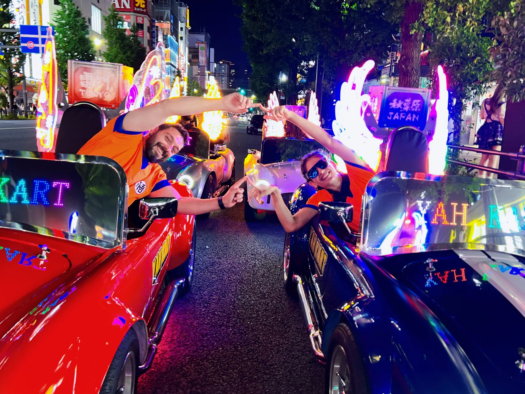 YAH KART guests enjoying a Tokyo street go-kart ride at night
